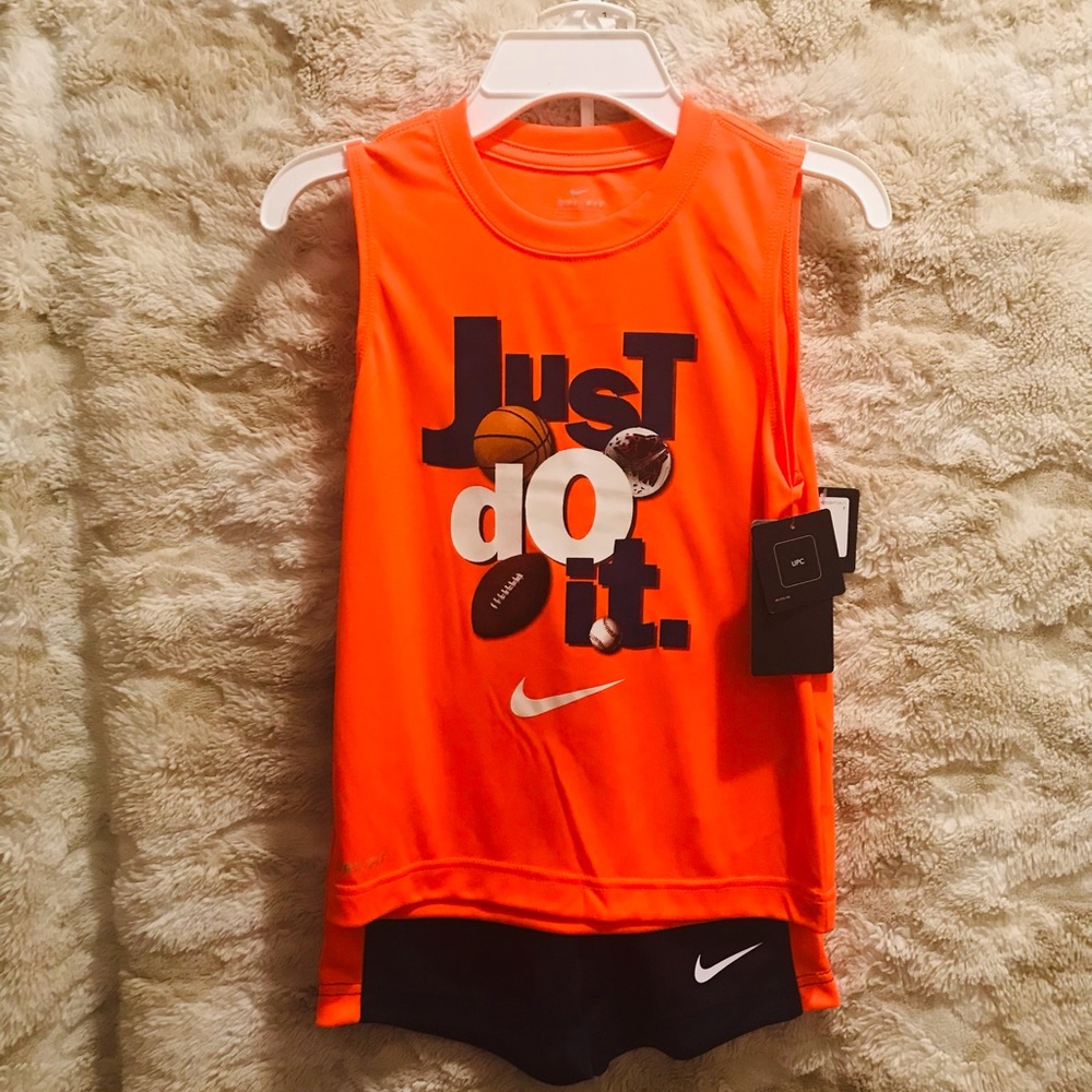 NWT 2 piece (shirt & shorts) muscle set
